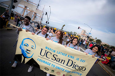 https://www.compassionatefutures.com/wp-content/uploads/2025/03/mlk-parade-2020.jpg