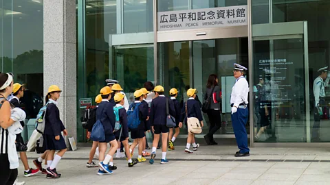 Alamy Children may fall behind, because they are missing out on opportunities to expand their intellectual horizons – such as music lessons and trips to museums (Credit: Alamy)