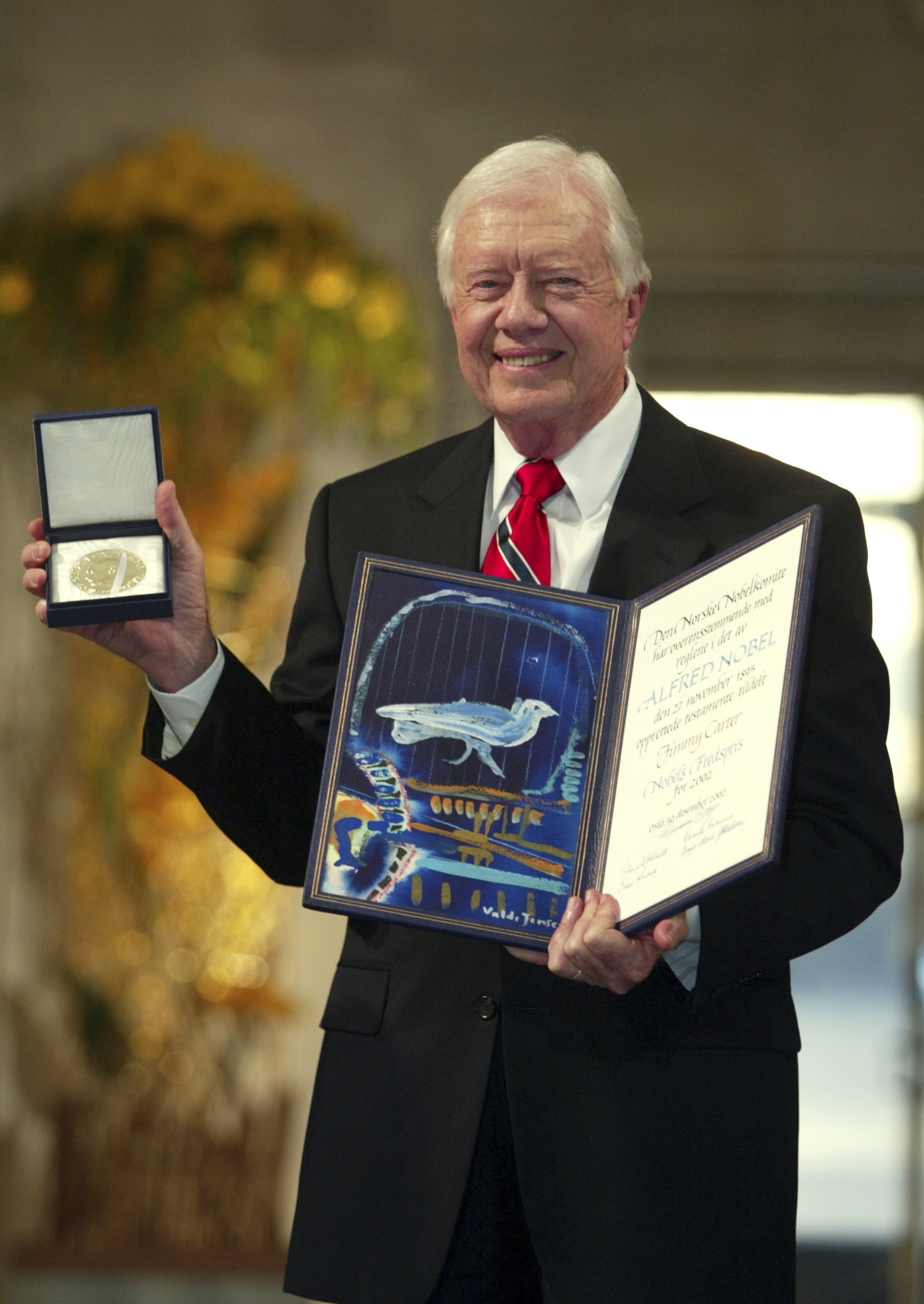 Former President Jimmy Carter receives the 2002 Nobel Peace Prize in Oslo City Hall in Oslo, Norway, Dec. 10, 2002.